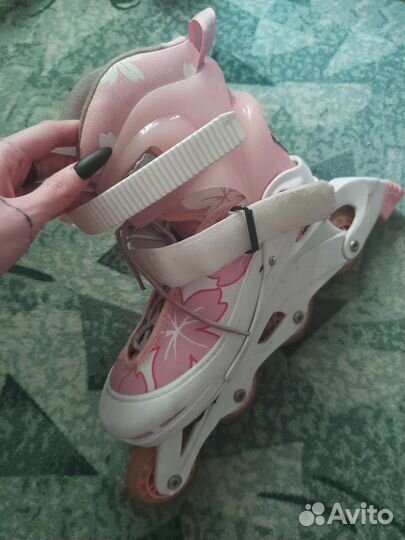 Роликовые коньки