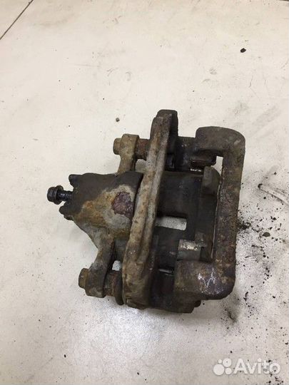 Суппорт задний левый Kia Sportage