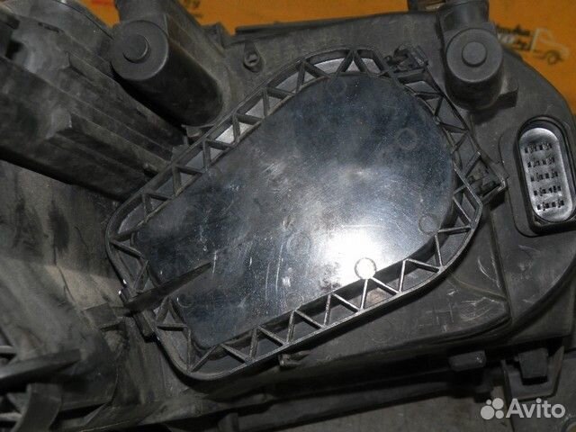 Фара левая Volkswagen Touran I (2003—2006) 8SLA5A