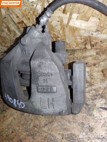 Суппорт тормозной передний левый Mazda 3 BL