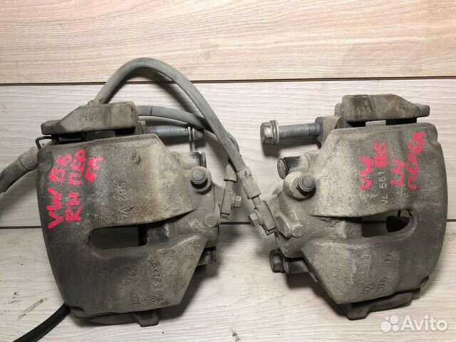 Суппорт Тормозной Передний лев прав VW Passat B6