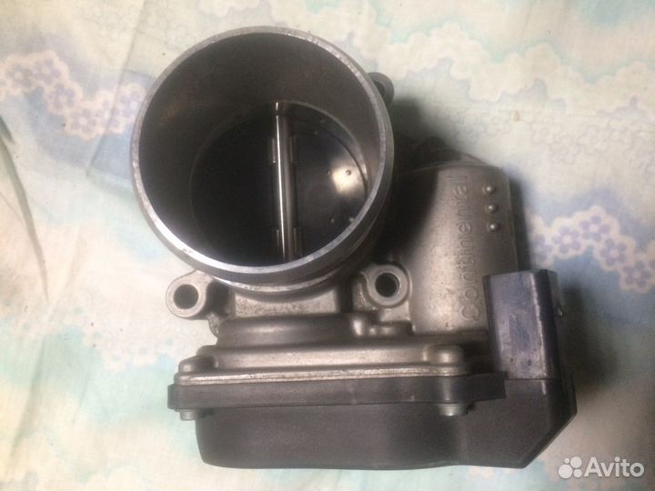 Дроссельная заслонка volkswagen 06F133062Q