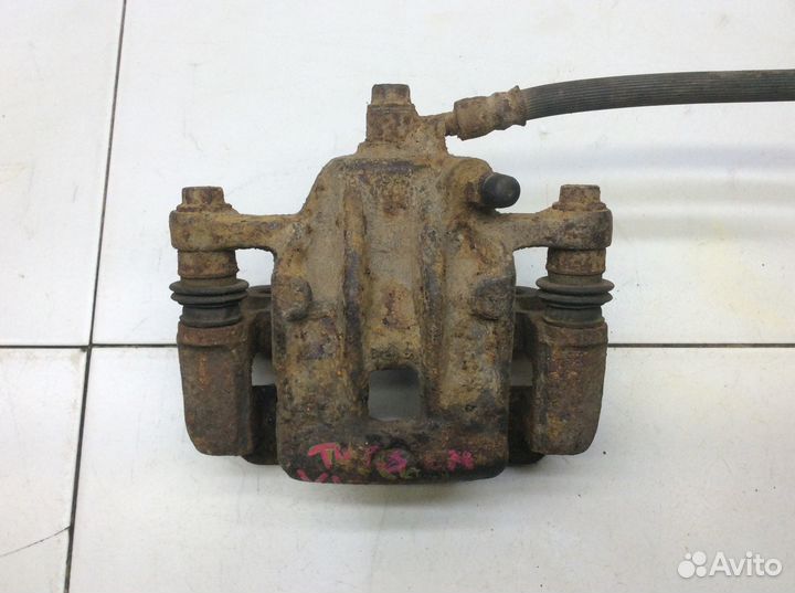 Суппорт задний левый Hyundai Tucson 1 Kia Sportage