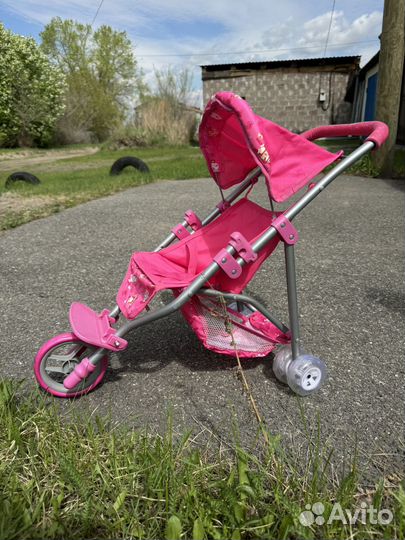 Игрушечная коляска для кукол