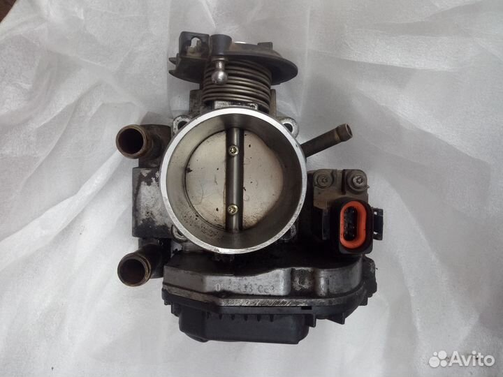 Дроссельная заслонка vag 058 133 063