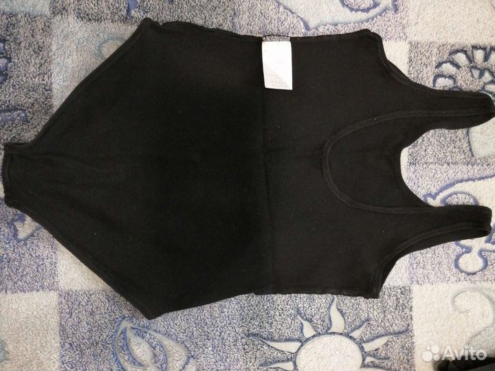 Гимнастические костюмы и пачки