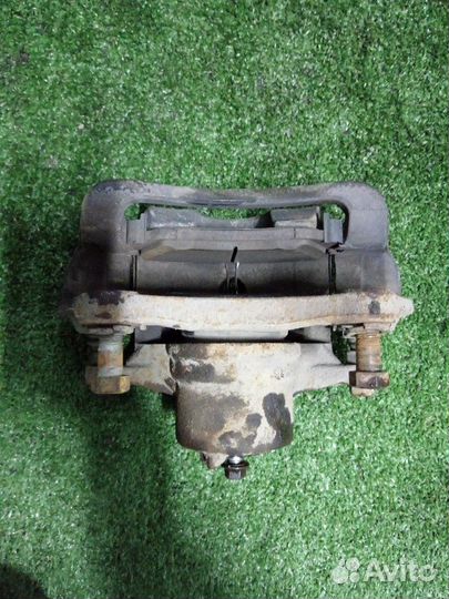 Суппорт тормозной передний левый Kia Optima JF