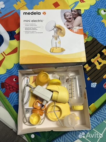 Молокоотсос medela электрический