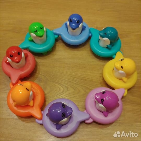 Игрушка для ванны 'Поющие дельфины'
