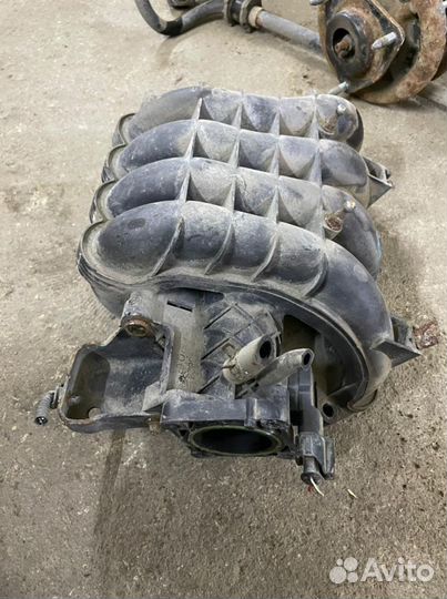 Впускной коллектор Митцубиси Лансер 10 1,5