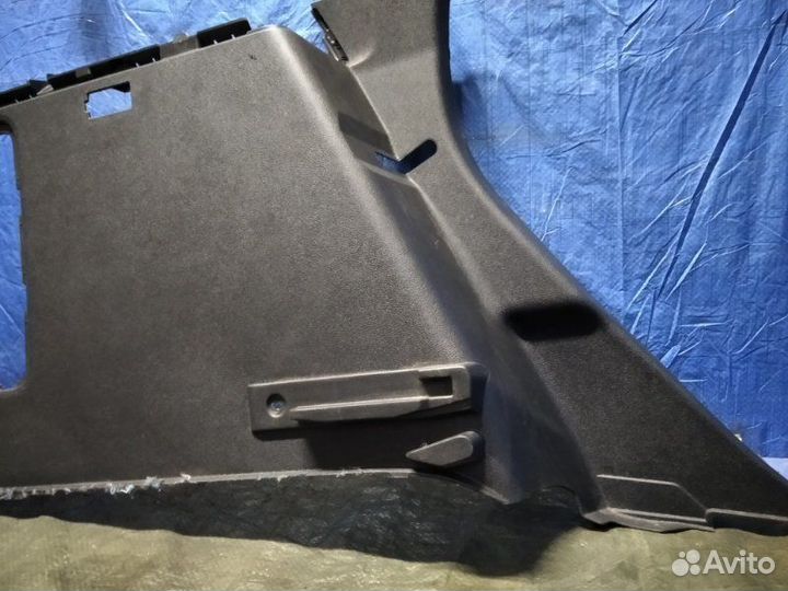 Обшивка багажника боковая задняя левая Renault