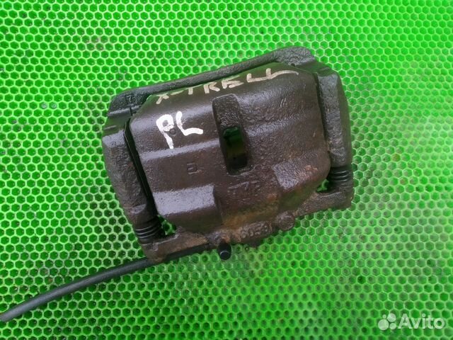 Тормозной суппорт передний левый Nissan X-Trail