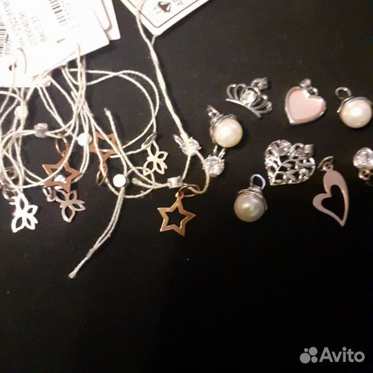 Отдам кулон новый серебро