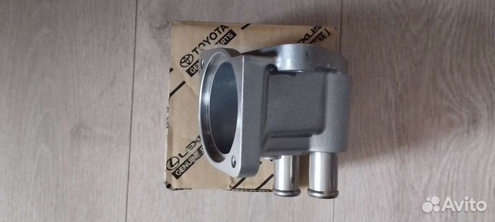 Корпус термостата 16323-37021 Toyota Corolla