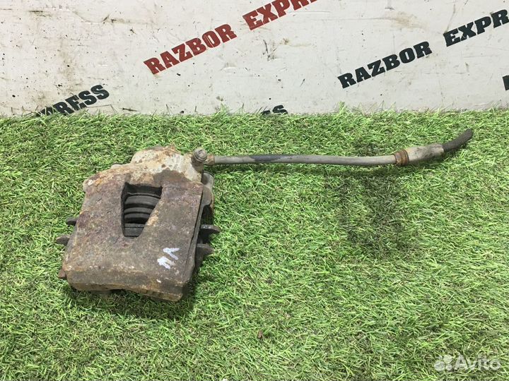 Суппорт тормозной передний левый Skoda Yeti