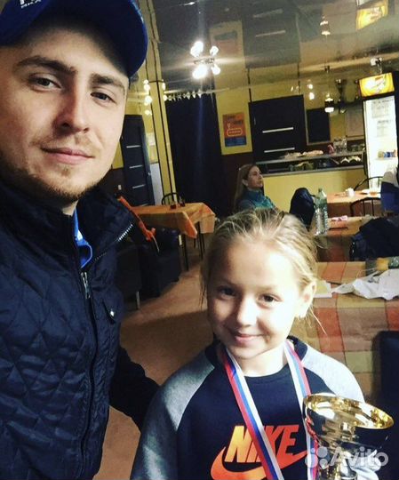 Тренер по большому теннису