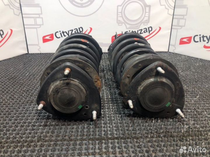 Стойка подвески передняя левая Toyota Raum NCZ25