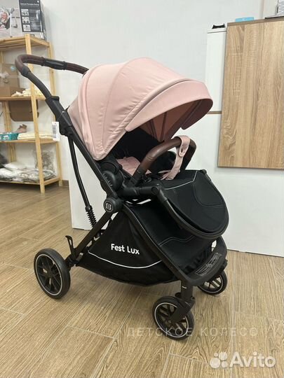 Коляска с перекидной ручкой, реверсивный блок