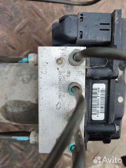 Блок ABS Nissan Almera Classic