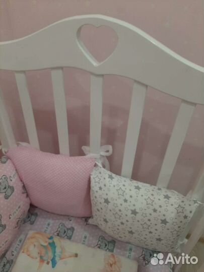 Детская кроватка с продольным маятником