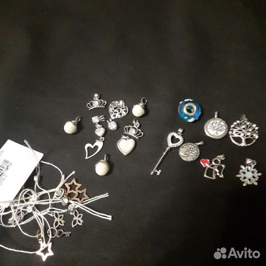 Отдам кулон новый серебро
