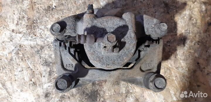 Суппорт тормозной передний левый Infiniti FX35 I р