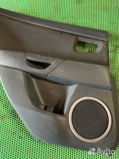 Обшивка карта двери задняя левая Mazda 3 BK