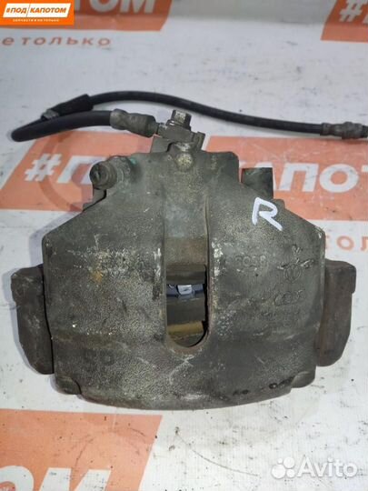 Суппорт тормозной передний правый Volkswagen Golf