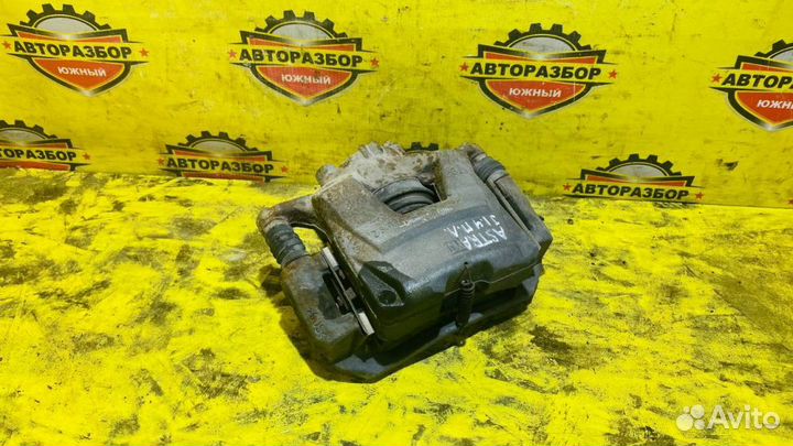 Суппорт передний левый Opel Astra J