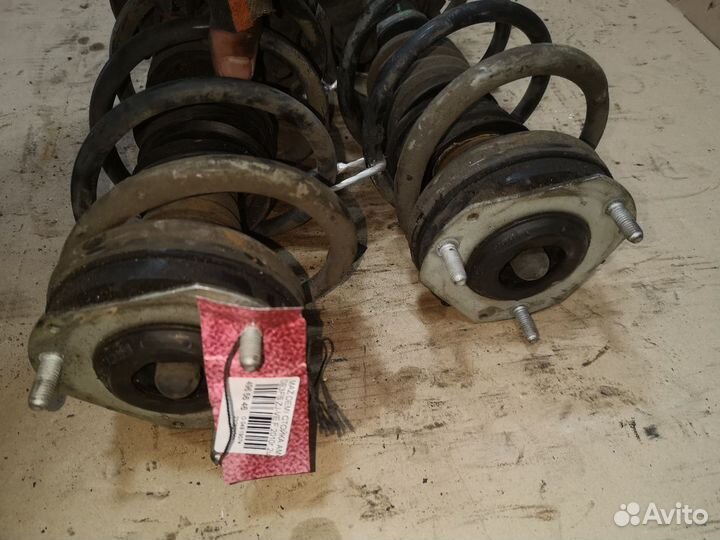 Стойки амортизаторов перед mazda 2 2010