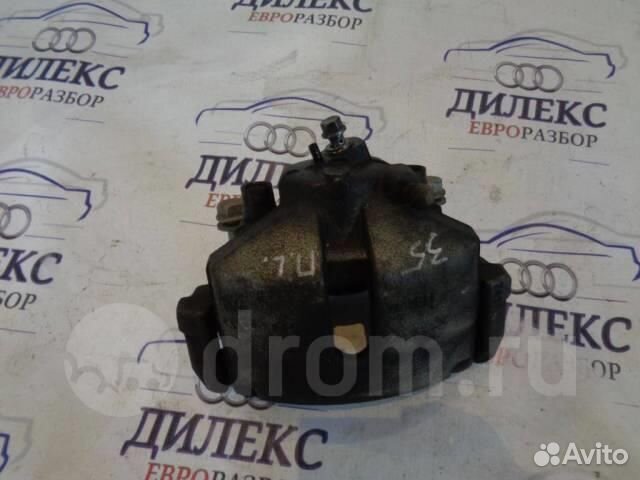 Суппорт передний левый VW Passat (B6) 2005-2010