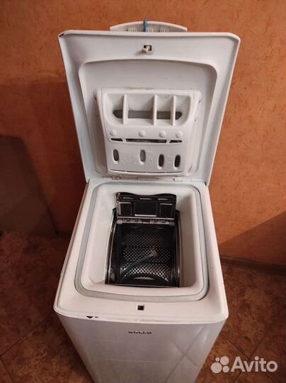 Стиральная машина с вертикальной загрузкой