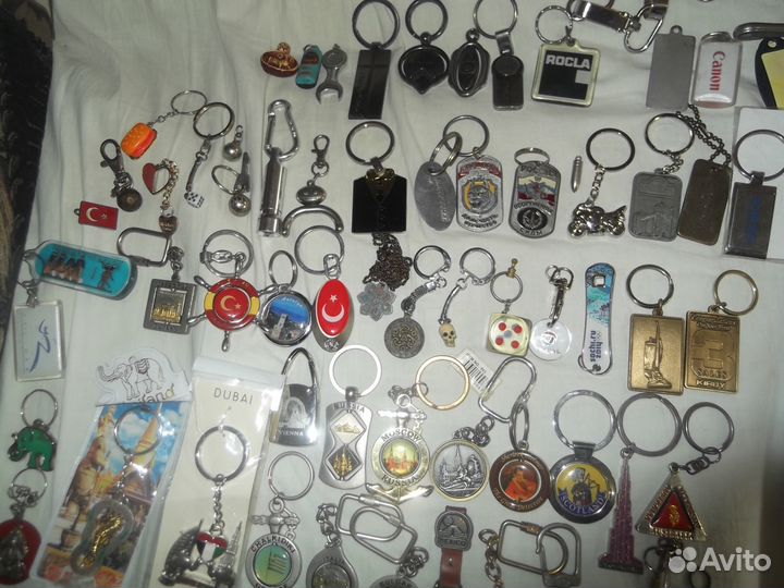 Брелки разные,зажигалки,компас,спички и др