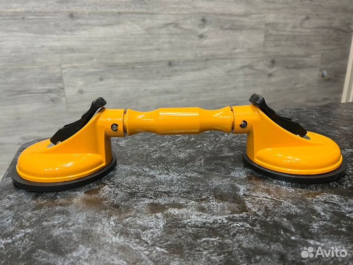 Вакуумная присоска на шарнирах