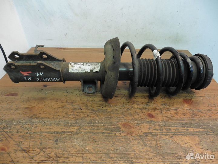 Стойка (амортизатор) в сборе левая Опель Астра J
