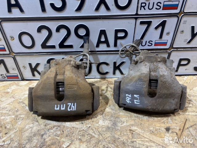 Суппорт тормозной передний Volkswagen Passat B5