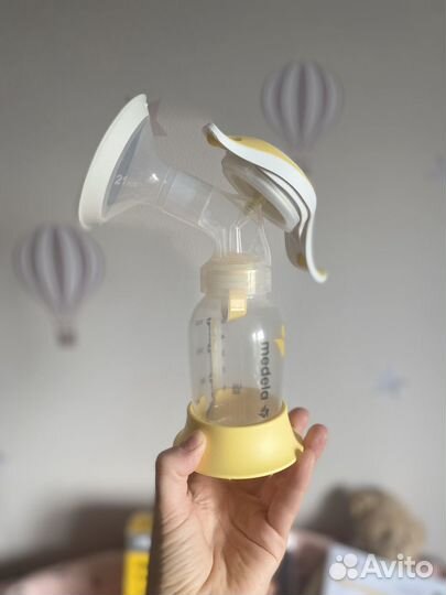 Набор для кормления medela (молокоотсос, накладки)