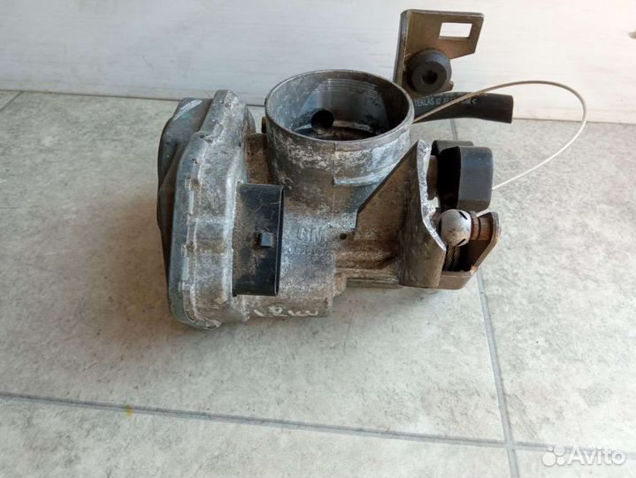Дроссельная заслонка Opel Astra G 90536084