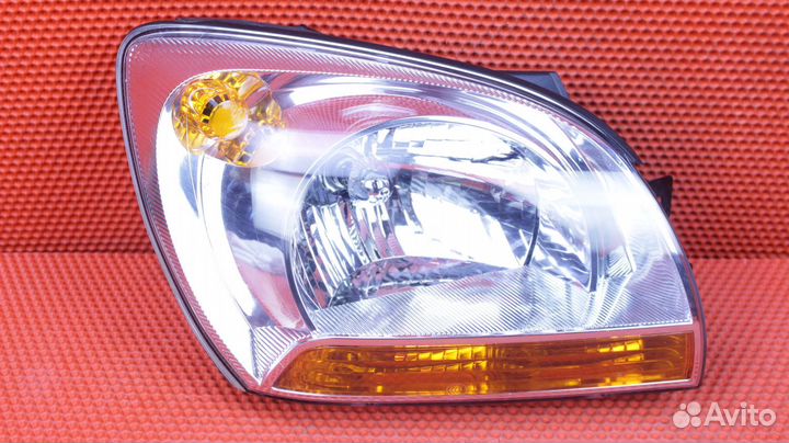 Фара правая Kia Sportage KM G6BA 92102-1F010