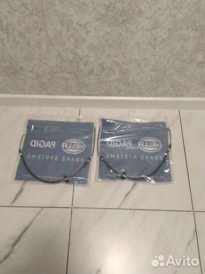 Трос стояночного тормоза