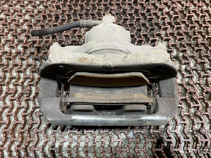 Суппорт передний левый астраj Opel Astra