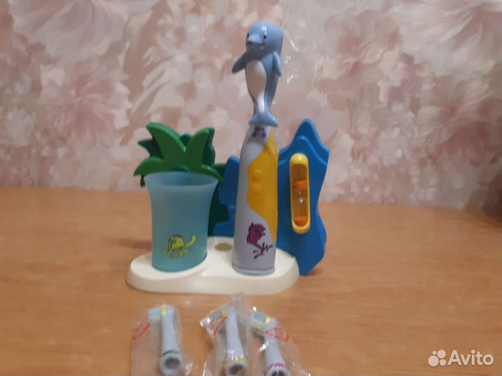 Электронная зубная щетка