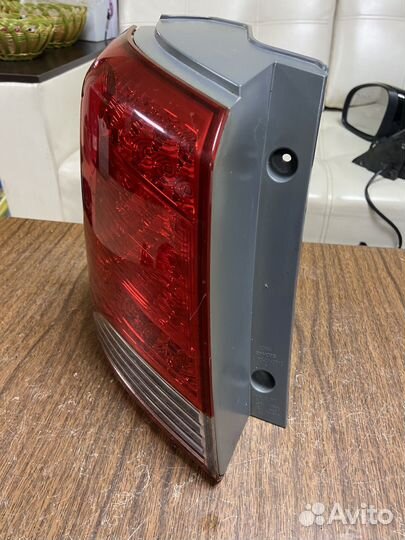 Фонарь левый наружный LED Kia Sorento 2 дорест