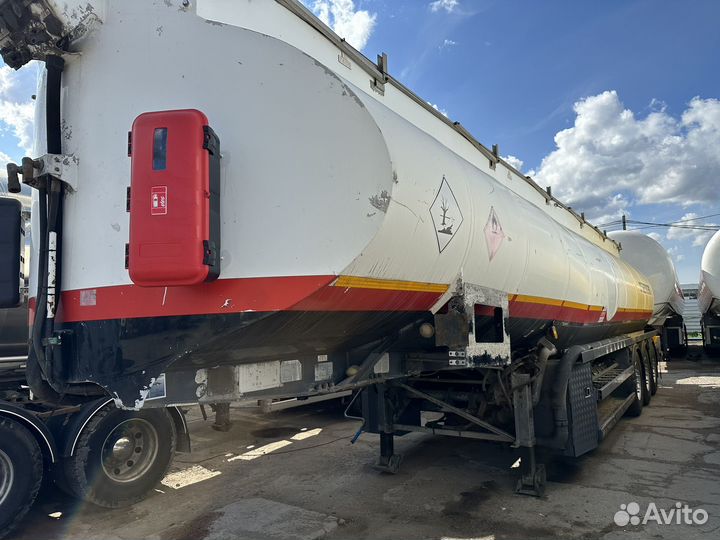 Полуприцеп бензовоз Heil HB 9000 23 S1, 2002