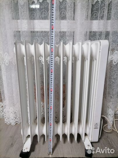 Масляный обогреватель