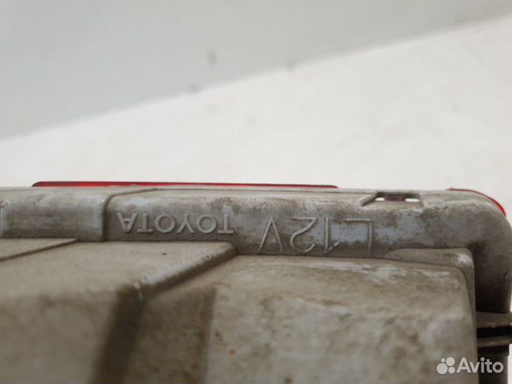 Фонарь противотуманный задний левый Toyota Land