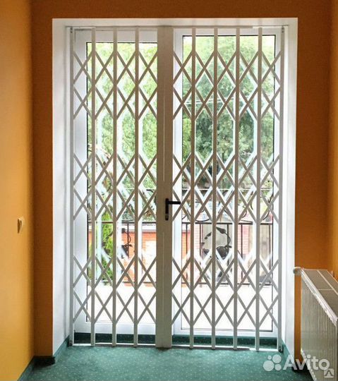 Раздвижные металлические решетки на окна