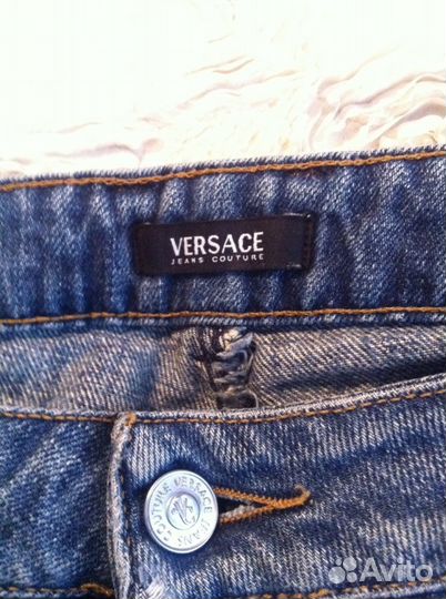 Джинсы versace