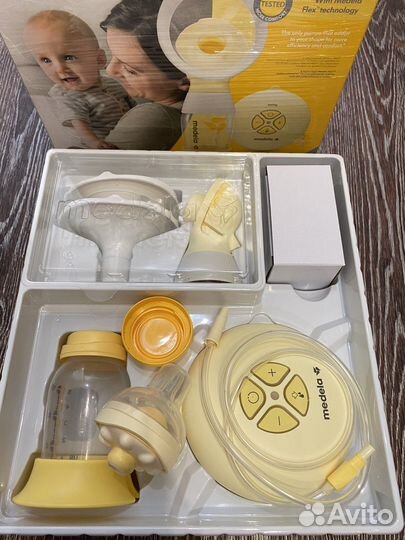 Молокоотсос medela swing flex электрический