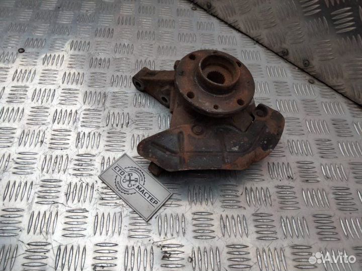 Кулак поворотный левый Fiat Doblo 1.3